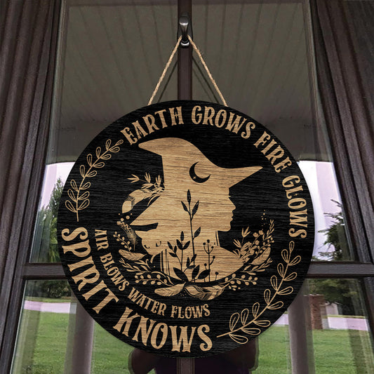 Earth Grows Fire Glows Wood Sign