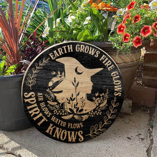 Earth Grows Fire Glows Wood Sign