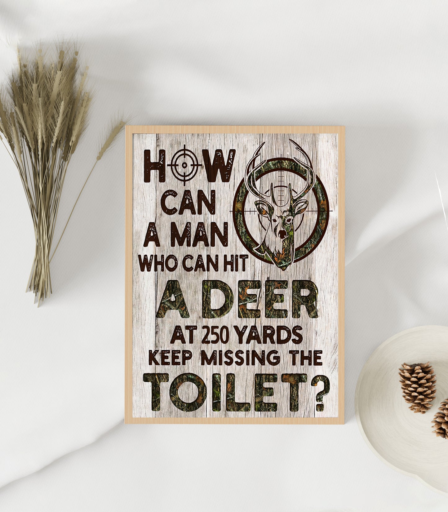 How Can A Man Can Hit A Deer At 250 Yards Keep Missing The Toilet Poster