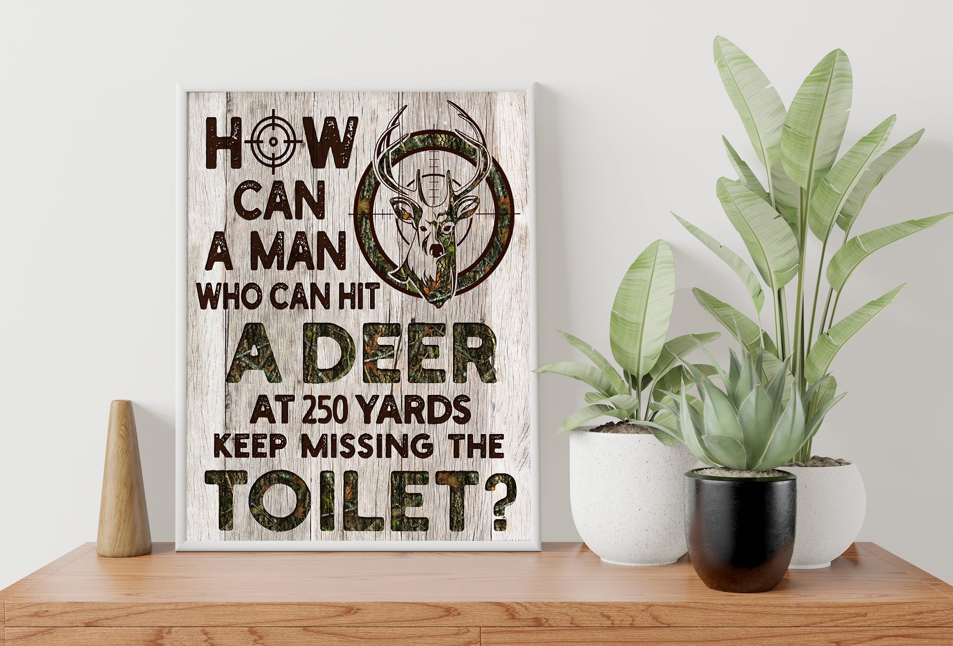 How Can A Man Can Hit A Deer At 250 Yards Keep Missing The Toilet Poster